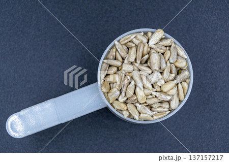 beautiful texture ripe of natural sunflower seeds on background beautiful texture ripe of natural sunflower seeds on background 137157217