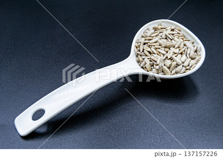 beautiful texture ripe of natural sunflower seeds on background beautiful texture ripe of natural sunflower seeds on background 137157226