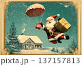 Santa dropping a present with a parachute near a cozy home in winter 137157813