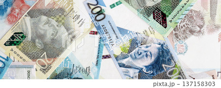 Peruvian sol paper banknotes pile on table. Peru PEN currency money bills in big amount. Concept of economics, taxation and banking in Peru 137158303
