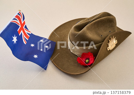 Australian flag, slouch hat, poppy symbolising anzac day remembrance 137158379