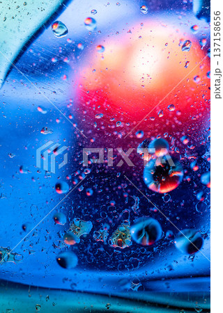 Vibrant Red and Blue Fluid Macro Oil Bubbles Texture Vibrant Red and Blue Fluid Macro Oil Bubbles Texture 137158656