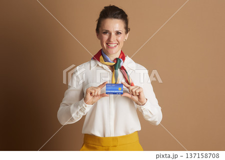 Smiling Professional Woman with Credit Card 137158708