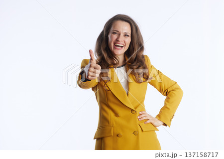 Confident Businesswoman Giving Thumbs Up and Smiling 137158717