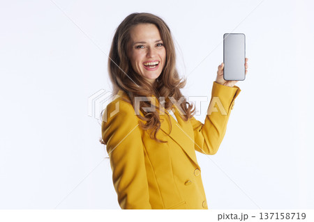 Engaging Businesswoman Holding a Smartphone Engaging Businesswoman Holding a Smartphone 137158719