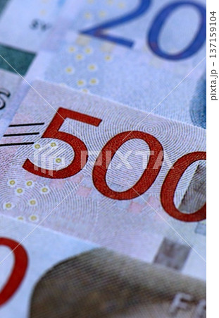 Swedish krona paper banknotes pile on table. Sweden SEK currency money bills in big amount. Concept of economics, taxation and banking in Sweden Swedish krona paper banknotes pile on table. Sweden SEK currency money bills in big amount. Concept of economics, taxation and banking in Sweden 137159104
