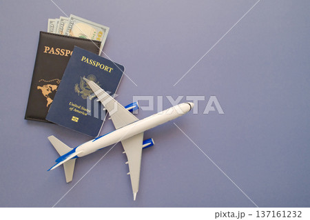 United States passport in leather cover with airplane model, travel and immigration concept United States passport in leather cover with airplane model, travel and immigration concept 137161232