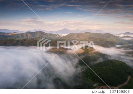 Mountain range with foggy in the morning 137166808