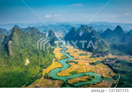 Phong Nam Valley with rice field and river flows through traditional village in countryside 137167155