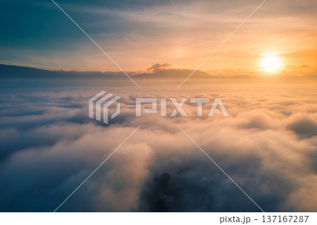 Golden sunrise over sea of fog and mountain Golden sunrise over sea of fog and mountain 137167287