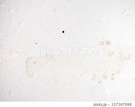 Mold on bathroom enamel. Mold spores in the bathroom. Black dots on a white background. A problem for everyday life. The need for a cleaning agent 137167998