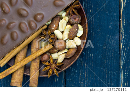 Tile of milk chocolate with hazelnut. Real milk chocolate. Tile of milk chocolate with hazelnut. Real milk chocolate. 137170111