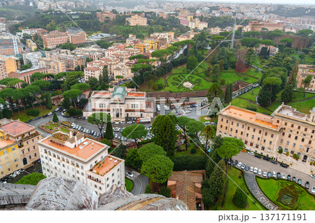View from a high point over gardens and buildings in Rome during a cloudy day 137171191