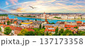 Budapest skyline panorama of Hungarian Parliament and Calvinist church on the Danube 137173358