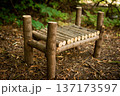 wooden children bed in the forest 137173597