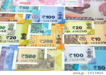 Big pile of Indian Rupees money bills banknotes close up. Lots of money of Indian INR currency cash in big bunch. Economics and business in India Big pile of Indian Rupees money bills banknotes close up. Lots of money of Indian INR currency cash in big bunch. Economics and business in India 137174025