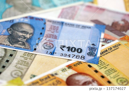 Big pile of Indian Rupees money bills banknotes close up. Lots of money of Indian INR currency cash in big bunch. Economics and business in India Big pile of Indian Rupees money bills banknotes close up. Lots of money of Indian INR currency cash in big bunch. Economics and business in India 137174027
