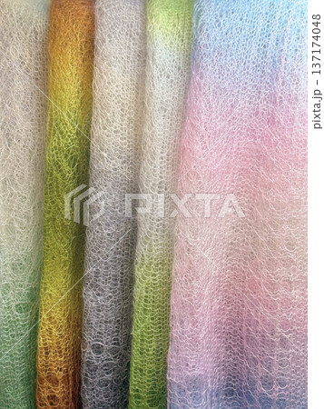 Mohair texture background with soft pastel gradient fabric in vertical folds, showing detailed mohair texture and fiber structure. Natural background for textile mockup, copy space Mohair texture background with soft pastel gradient fabric in vertical folds, showing detailed mohair texture and fiber structure. Natural background for textile mockup, copy space 137174048