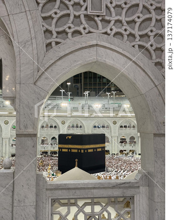 Pilgrims performing tawaf around the Kaaba at Masjid al-Haram in Mecca during pilgrimage Pilgrims performing tawaf around the Kaaba at Masjid al-Haram in Mecca during pilgrimage 137174079
