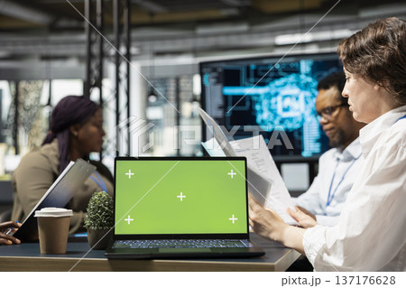 Isolated screen laptop used by software developers doing brainstorming to create AI models. IT experts cooperating on large language model artificial intelligence project using mockup notebook Isolated screen laptop used by software developers doing brainstorming to create AI models. IT experts cooperating on large language model artificial intelligence project using mockup notebook 137176628