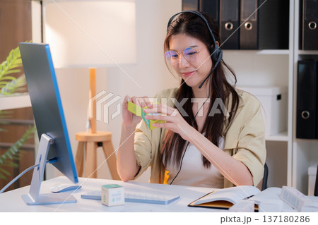 Young asian creative woman development packaging cosmetic and skincare product design with AI. Young asian creative woman development packaging cosmetic and skincare product design with AI. 137180286