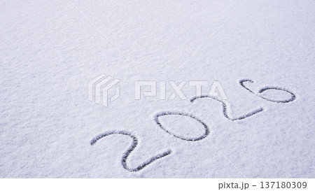 Written sketch for new year 2026. Snow background numbers ice outdoor on ground in winter. Writing text sign and drawing on field in nature frozen background. Copy space Written sketch for new year 2026. Snow background numbers ice outdoor on ground in winter. Writing text sign and drawing on field in nature frozen background. Copy space 137180309