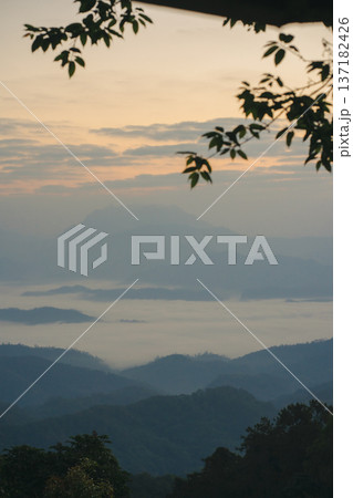 sunrise with moving of cloud and clear sky and layer of mountain sunrise with moving of cloud and clear sky and layer of mountain 137182426