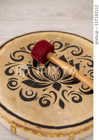 Tambourine sound therapy. Rhythm instrument. Tool for calming spiritual meditation wellness retreat for healing relaxing treatment. Tambourine sound therapy. Rhythm instrument. Tool for calming spiritual meditation wellness retreat for healing relaxing treatment. 137183112