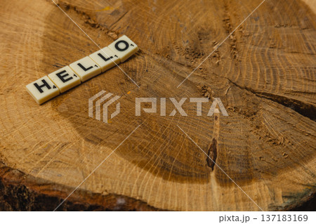Celebrate National Scrabble Day with letters on a wooden surface Celebrate National Scrabble Day with letters on a wooden surface 137183169