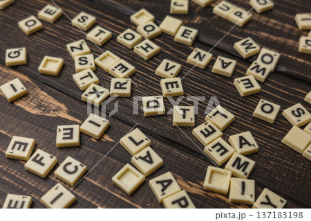 Words on a table for National Scrabble Day celebration Words on a table for National Scrabble Day celebration 137183198