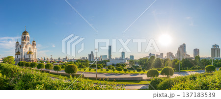 Panorama of spring or summer Yekaterinburg and Temple on Blood in orange sunset light. Yekaterinburg, Russia Panorama of spring or summer Yekaterinburg and Temple on Blood in orange sunset light. Yekaterinburg, Russia 137183539