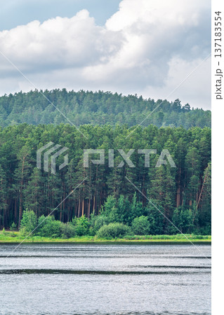 Blue lake with cloudy sky, natural background Blue lake with cloudy sky, natural background 137183554