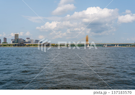 The Millennium Bridge over the Kazanka River on a summer day. The Millennium Bridge over the Kazanka River on a summer day. 137183570