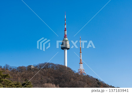 N Seoul Tower with autumn landscape. It is also known as Namsan Tower or Seoul Tower, the landmark which is a communication and observation tower located on Nam Mountain in central Seoul, South Korea 137183941