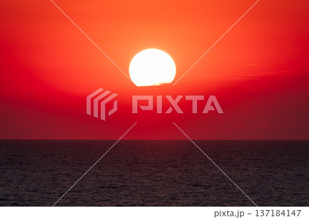 Beautiful red and orange sunrise over the sea. 137184147