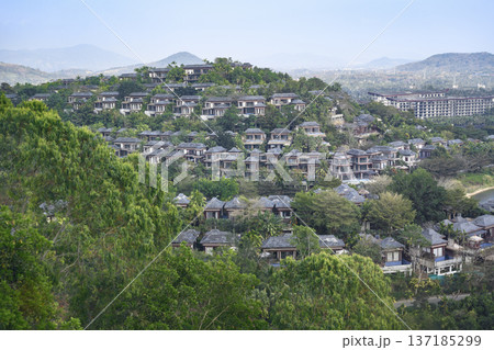 Aerial view of a bungalow on a mountainside near Sanya city on Hainan Island in China 137185299