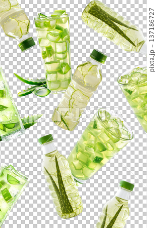 Multiple glasses and bottles with green aloe drink and cubes isolated on white background, concept of freshness Multiple glasses and bottles with green aloe drink and cubes isolated on white background, concept of freshness 137186727