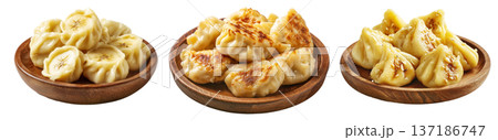 Set of Steamed Banana dumplings with intricate twisted edges, isolated on white background. Concept of Asian cuisine and food art 137186747