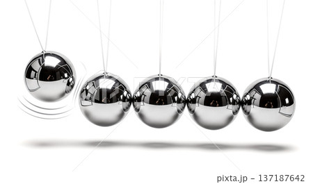 Silver newton cradle balls swinging and hitting on white background concept of momentum impact cause effect physics energy action reaction 137187642