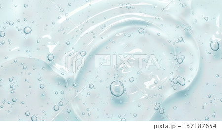 Top view texture of transparent blue cosmetic gel with bubbles and waves representing hygiene product or moisturizing serum for skincare beauty background Top view texture of transparent blue cosmetic gel with bubbles and waves representing hygiene product or moisturizing serum for skincare beauty background 137187654