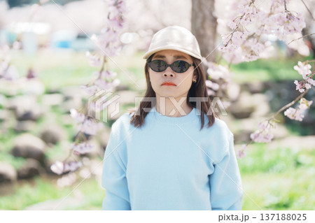 Woman tourist sightseeing Kitakami Tenshochi Park with Sakura Cherry Blossom in Spring, traveler travel in Kitakami festival, Iwate prefecture, Japan. Landmark for Travel and Vacation destination 137188025