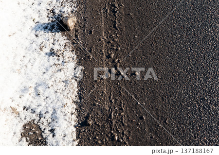 Sunlight Deicing Road Surface after Salt Application in Winter 137188167