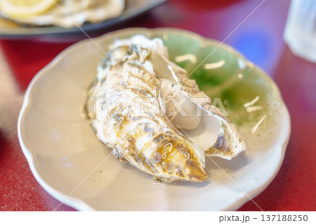 grilled Oyster in Matsushima fish market, seafood famous and popular of Matsushima bay in Miyagi Prefecture, Tohoku, Japan grilled Oyster in Matsushima fish market, seafood famous and popular of Matsushima bay in Miyagi Prefecture, Tohoku, Japan 137188250