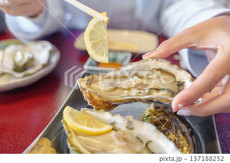fresh Oyster in Matsushima fish market, seafood famous and popular of Matsushima bay in Miyagi Prefecture, Tohoku, Japan fresh Oyster in Matsushima fish market, seafood famous and popular of Matsushima bay in Miyagi Prefecture, Tohoku, Japan 137188252