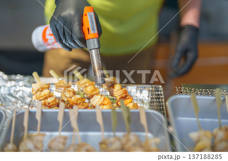 grilled Scallop and seafood in Kitakami Tenshochi Park in Spring, Sakura Cherry Blossom festival, Iwate prefecture, Japan. Landmark for Travel and Vacation destination grilled Scallop and seafood in Kitakami Tenshochi Park in Spring, Sakura Cherry Blossom festival, Iwate prefecture, Japan. Landmark for Travel and Vacation destination 137188285