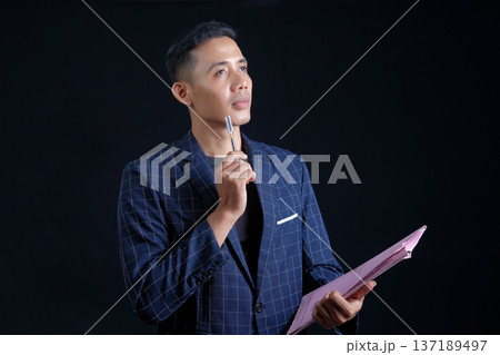 composite image of unsmiling asian businesswoman pointing composite image of unsmiling asian businesswoman pointing 137189497