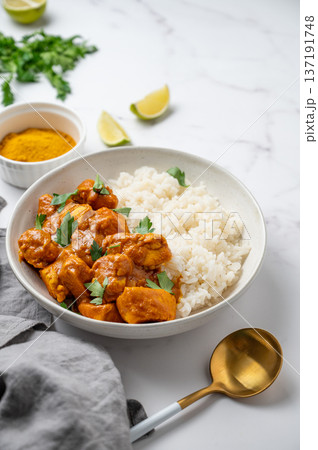 Chicken tikka masala curry with rice on marble background Chicken tikka masala curry with rice on marble background 137191748
