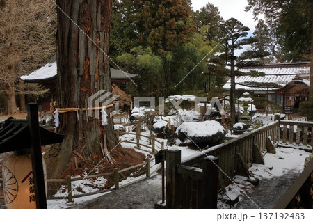 Kitaguchi Hongu Sengen Jinja Shrine in Fujiyoshida of Yamanashi Japan during the winter. This is the traditional Shinto entrance to the path to the summit of Mt. Fuji, and dates from the year 100AD 137192483