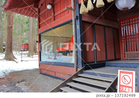 Kitaguchi Hongu Sengen Jinja Shrine in Fujiyoshida of Yamanashi Japan during the winter. This is the traditional Shinto entrance to the path to the summit of Mt. Fuji, and dates from the year 100AD 137192499