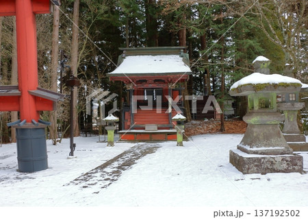 Kitaguchi Hongu Sengen Jinja Shrine in Fujiyoshida of Yamanashi Japan during the winter. This is the traditional Shinto entrance to the path to the summit of Mt. Fuji, and dates from the year 100AD 137192502